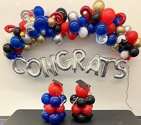 congratulations graduate balloon garland  banner and balloon sculptures