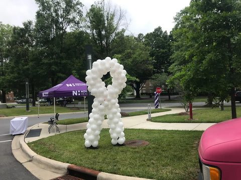 ’Empowering Hope: Breast Cancer Awareness and Balloon Decorations