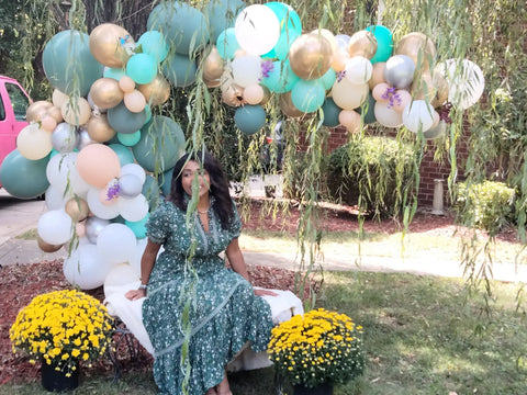 balloon garland in tree pink green chrome gold