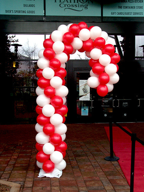 red and white candy cane balloon sculpture