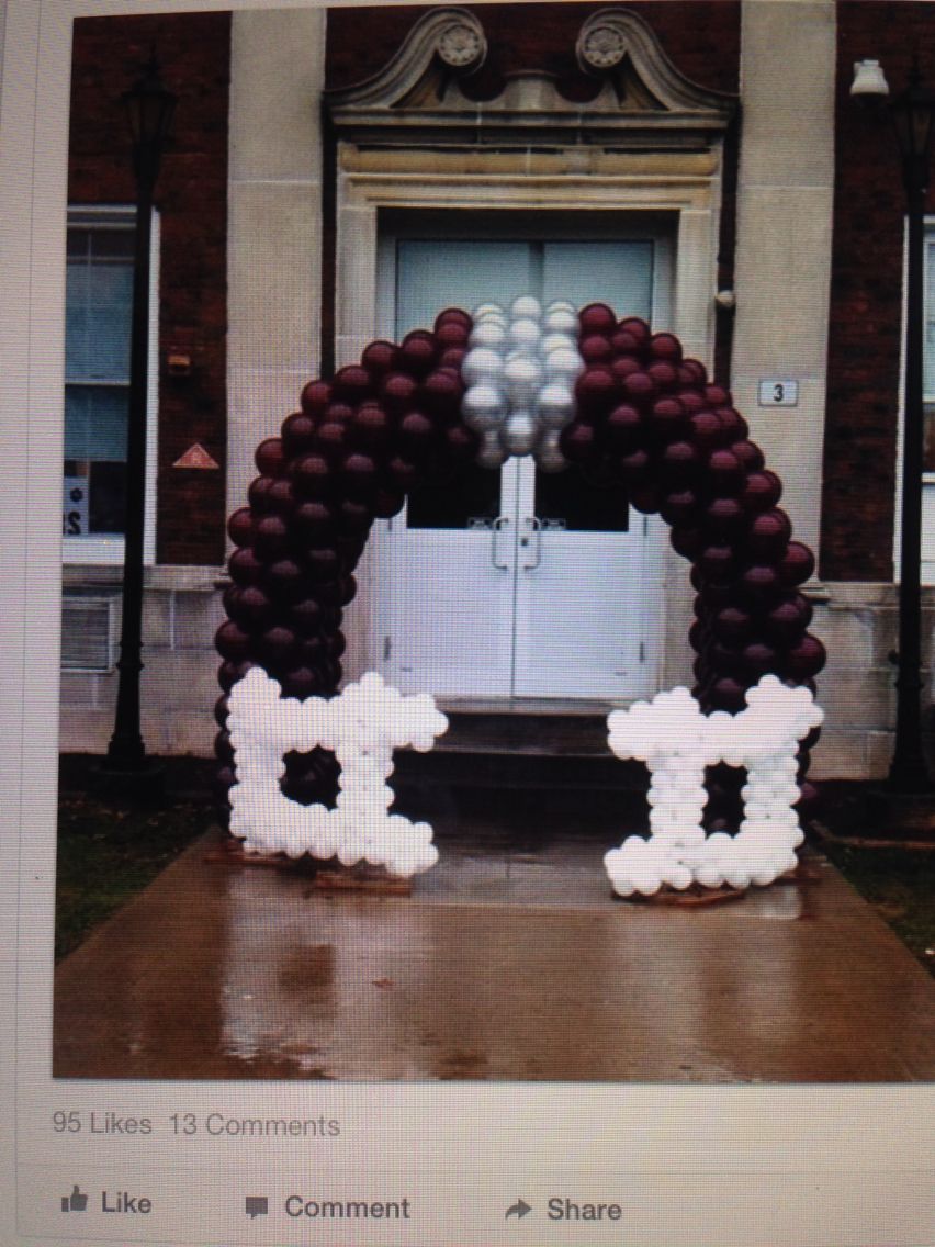 balloon arch shaped like a football helmet Football Helmet Tunnel Arch– Balloon & Party Charlotte