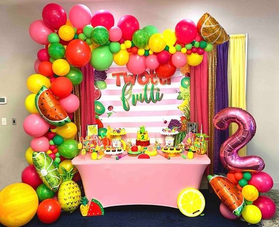 balloon arch garland fruit theme with number 2 and watermelon, pineapple, lime and orange shaped foil balloons